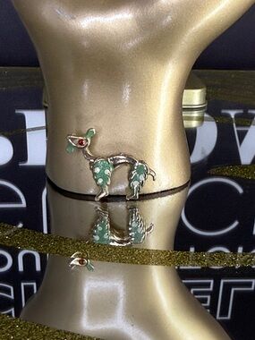 Gold-Tone Camel Brooch with Green Enamel and Red Eye